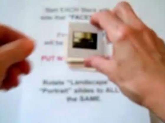 Placing the flipped slide on top of the stack